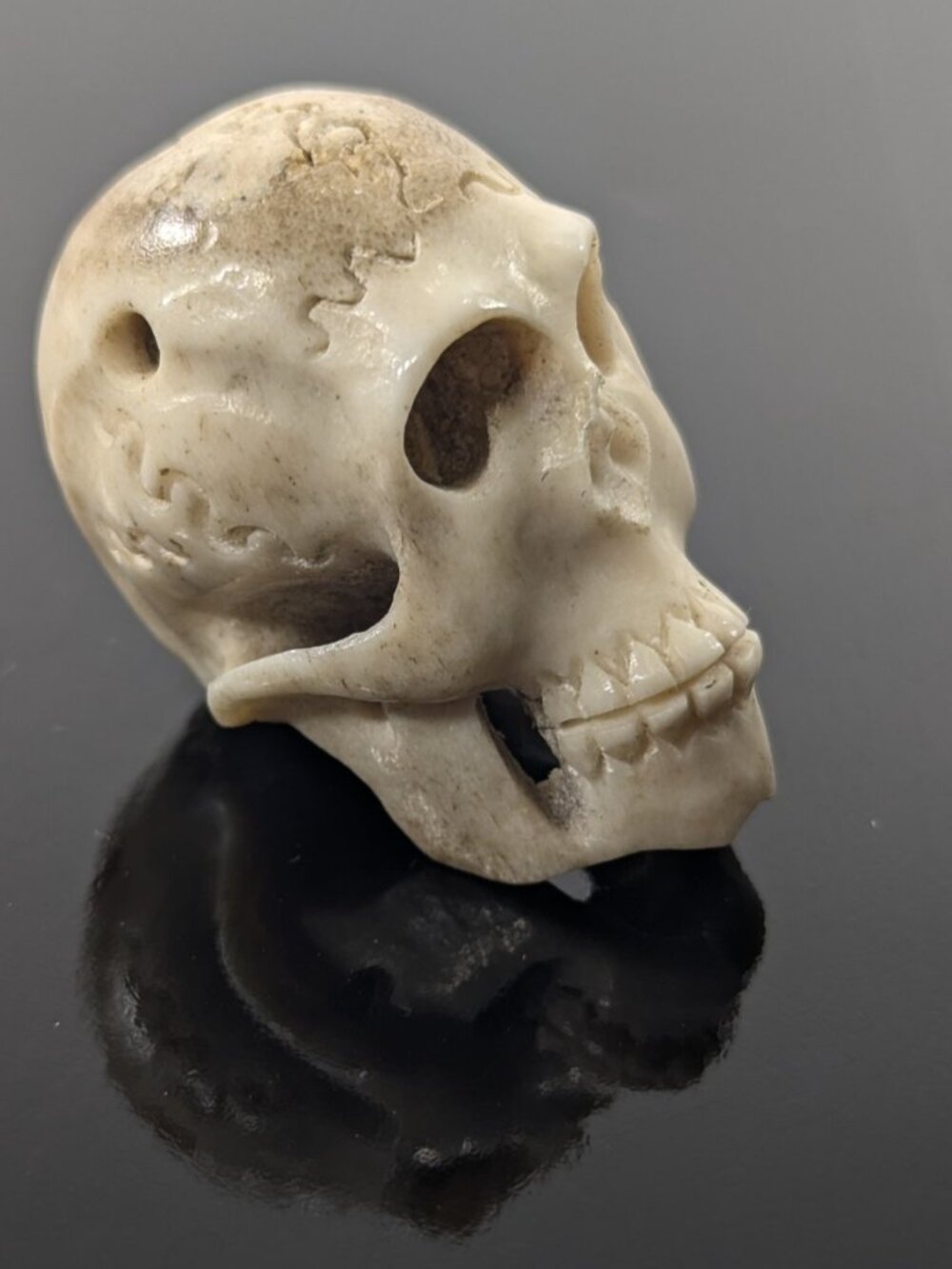 Vintage Memento Mori Deer Antler Carved Skull pendant, human skull bead